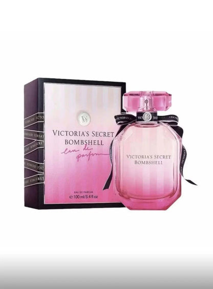 Victoria's Secret Bombshell perfume bottle and packaging on a white background